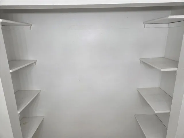 a view of small space with racks on the wall