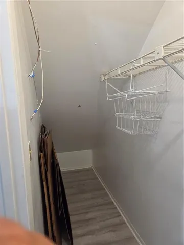 a view of balcony with wooden floor