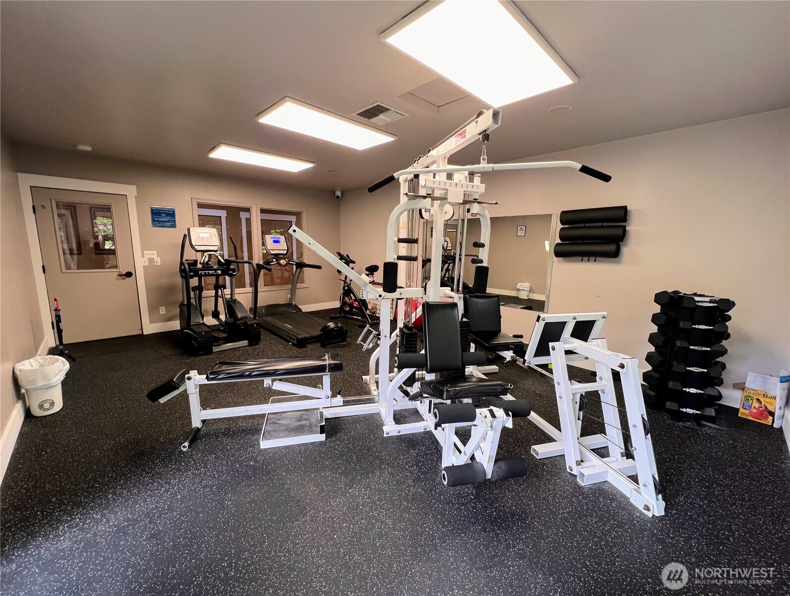15150 140th Way Southeast, Unit M201 Renton, WA 98058 - Photo 25 of 27 a view of a room with gym equipment
