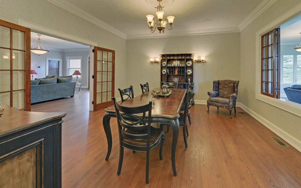 2465 Blue Ridge Drive Blue Ridge, GA 30513 - Photo 12 of 60 a view of a dining room with furniture and wooden floor