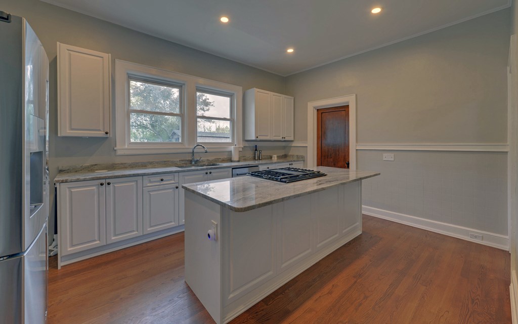 2465 Blue Ridge Drive Blue Ridge, GA 30513 - Photo 13 of 60 a kitchen with a sink stove and cabinets