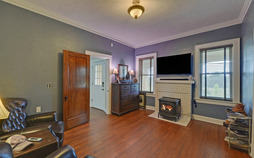 2465 Blue Ridge Drive Blue Ridge, GA 30513 - Photo 28 of 60 a living room with furniture and a flat screen tv