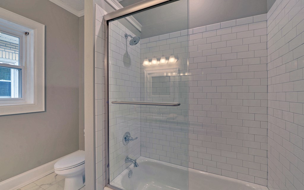 2465 Blue Ridge Drive Blue Ridge, GA 30513 - Photo 39 of 60 a bathroom with a shower and a toilet