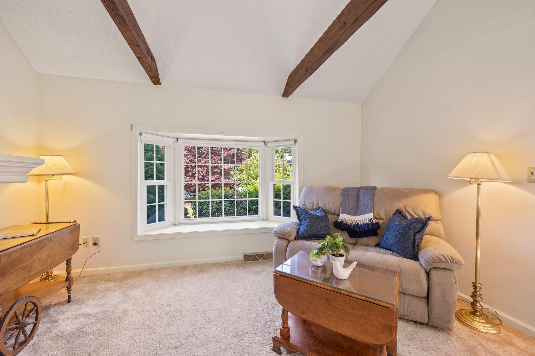 22 Debs Hill Road, Unit 6A Yarmouth Port, MA 02675 - Photo 11 of 30 a living room with furniture and a window