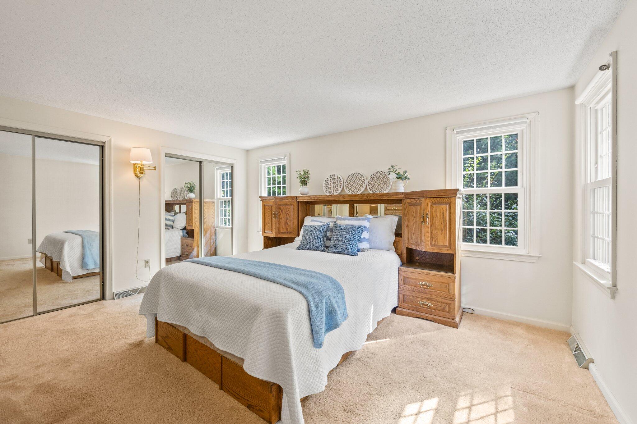 22 Debs Hill Road, Unit 6A Yarmouth Port, MA 02675 - Photo 14 of 30 a bedroom with a large bed and a window