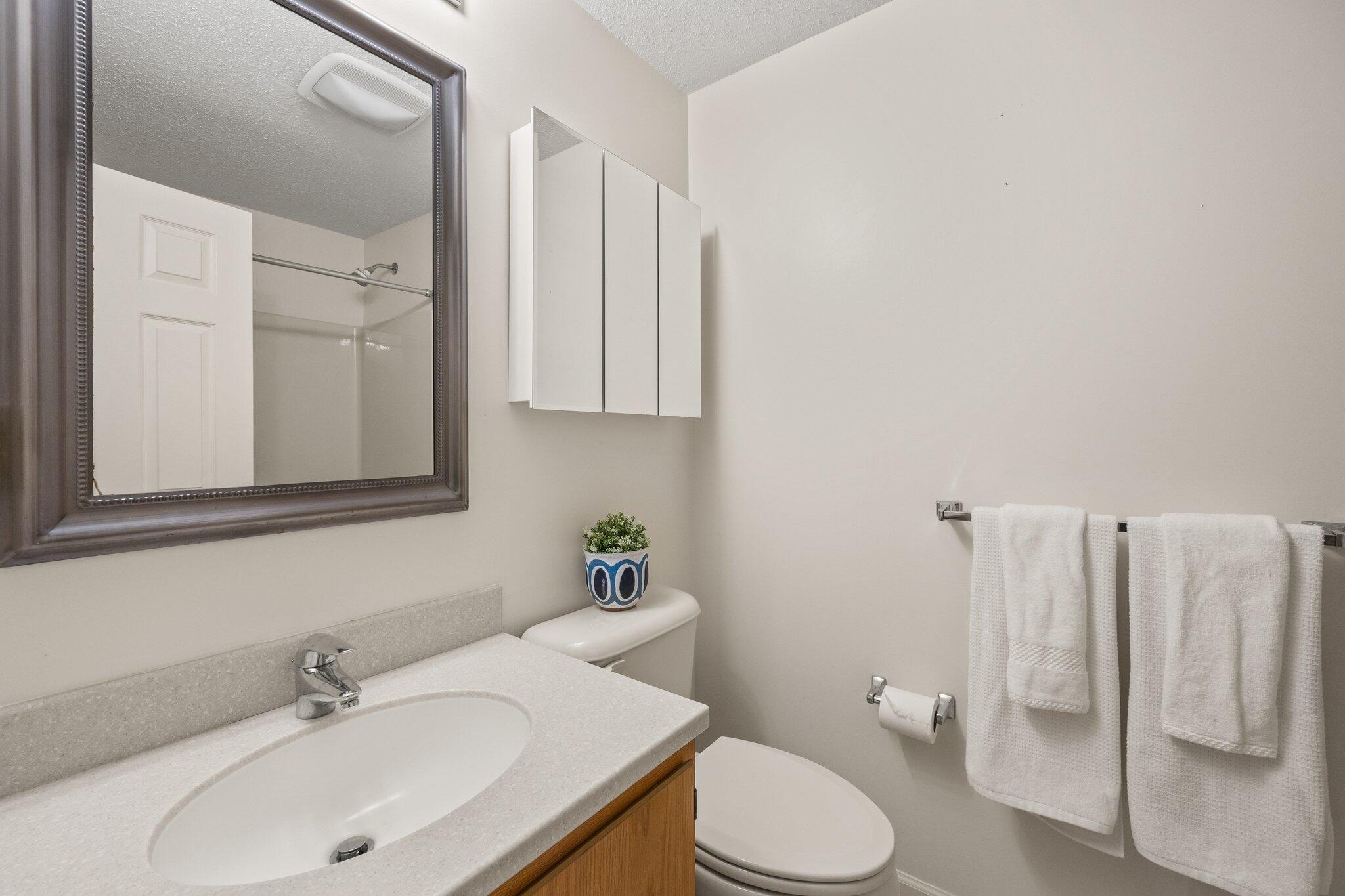 22 Debs Hill Road, Unit 6A Yarmouth Port, MA 02675 - Photo 21 of 30 a bathroom with a sink toilet and shower