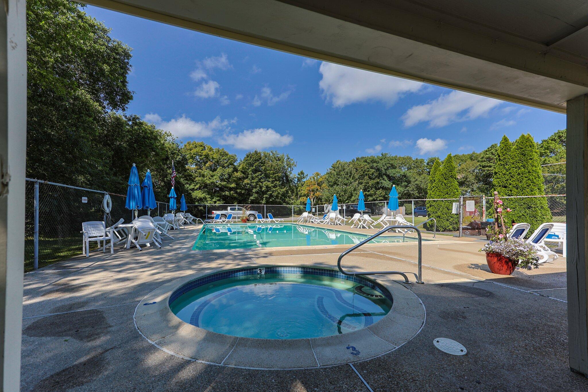 22 Debs Hill Road, Unit 6A Yarmouth Port, MA 02675 - Photo 28 of 30 a view of a swimming pool with a patio