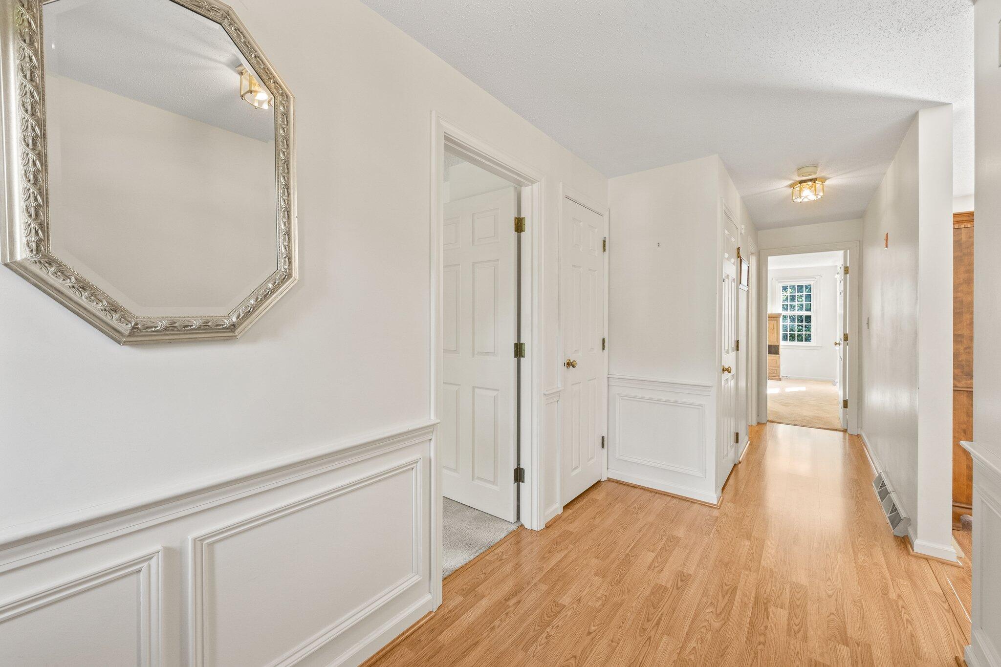 22 Debs Hill Road, Unit 6A Yarmouth Port, MA 02675 - Photo 4 of 30 a view of a room with wooden floor and cabinet