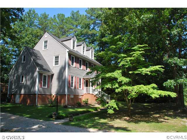 4733 Crossgate Road Chester, VA 23831 - Photo 1 of 9 a aerial view of a house with a yard