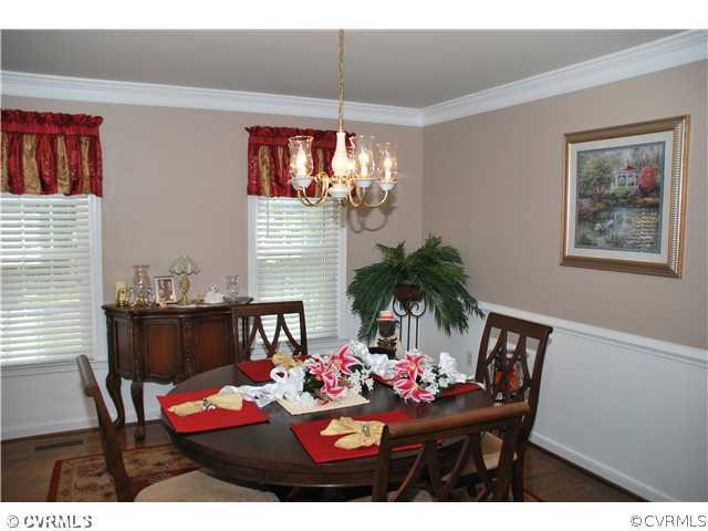 4733 Crossgate Road Chester, VA 23831 - Photo 3 of 9 a view of a dining room with furniture and window
