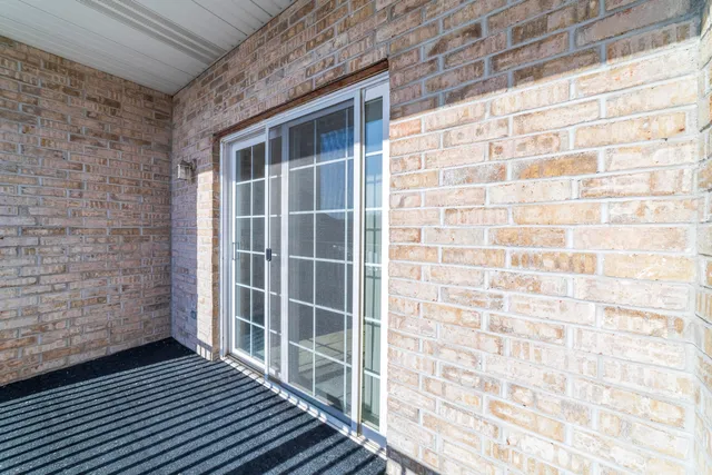 a view of a balcony with a window