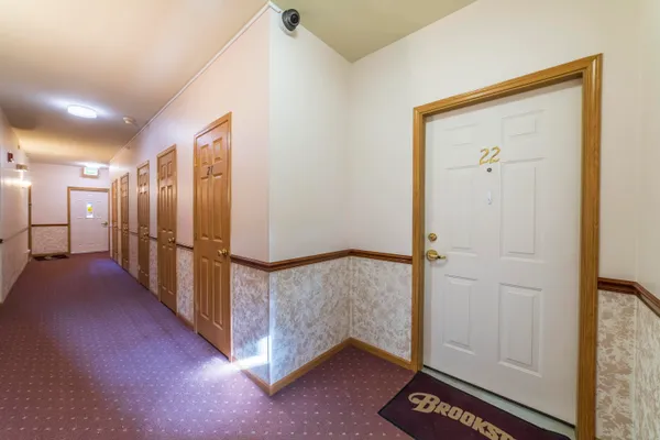 a view of a hallway with entryway