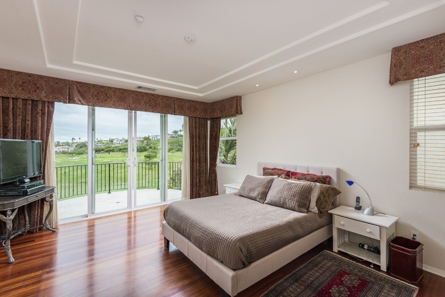 1356 Ranch Road Encinitas, CA 92024 - Photo 11 of 25 French doors open onto the large balcony from the master suite.