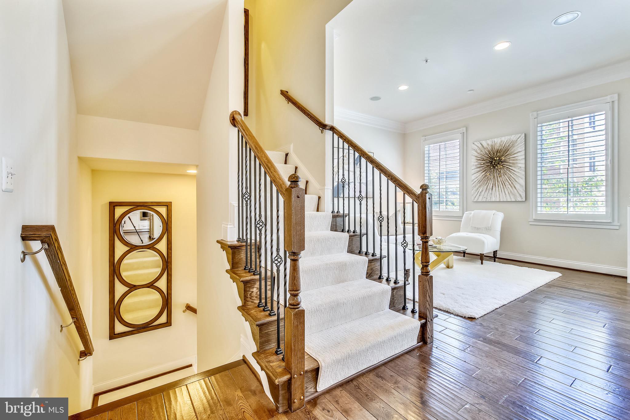 1411 Ridgeview Way Washington, DC 20007 - Photo 14 of 43 a view of a hallway with wooden floor and furniture
