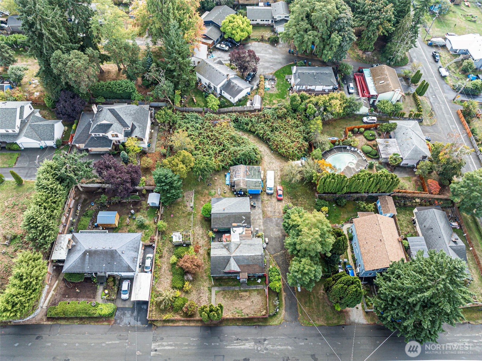 2635 Southwest 104th Street Seattle, WA 98146 - Photo 12 of 16 an aerial view of a houses with yard
