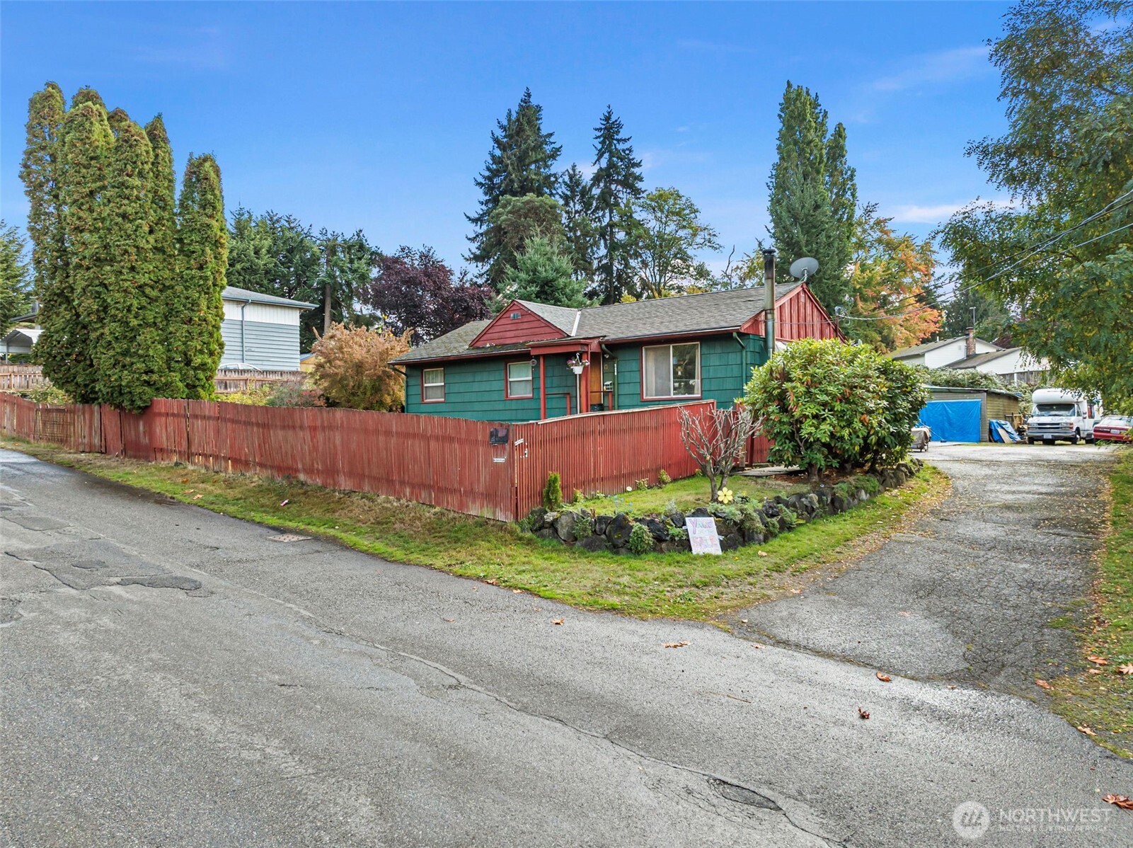 2635 Southwest 104th Street Seattle, WA 98146 - Photo 9 of 16 front view of a house with a yard