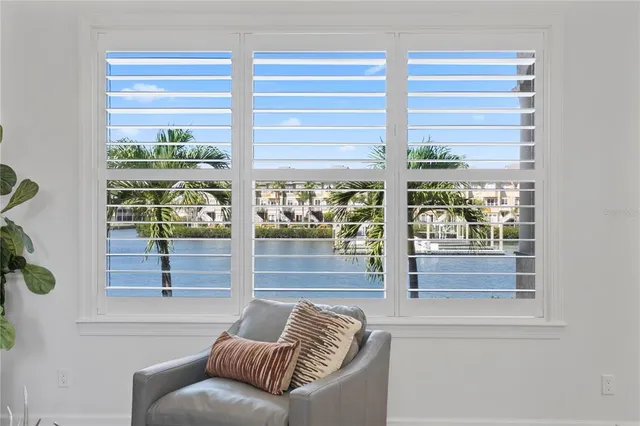 a bedroom with bed and window