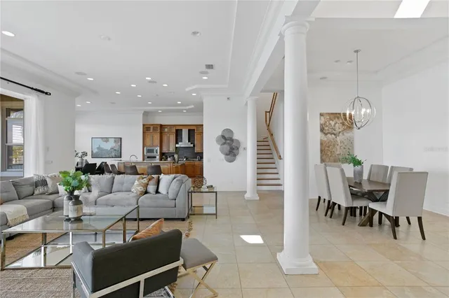 a bathroom with a granite countertop sink a large mirror and a bathtub