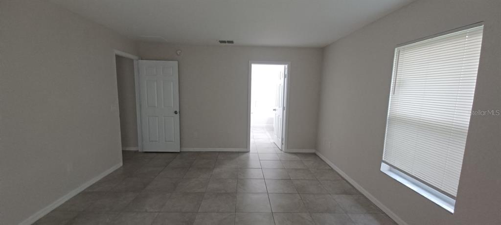8799 Southwest 66th Avenue Ocala, FL 34476 - Photo 11 of 28 a view of hallway with a window