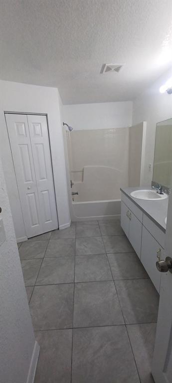 8799 Southwest 66th Avenue Ocala, FL 34476 - Photo 12 of 28 a bathroom with a sink and shower
