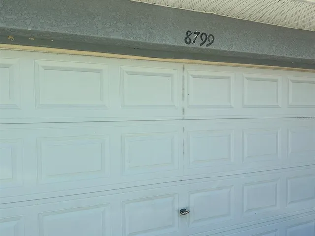 a kitchen with a sink stove and refrigerator