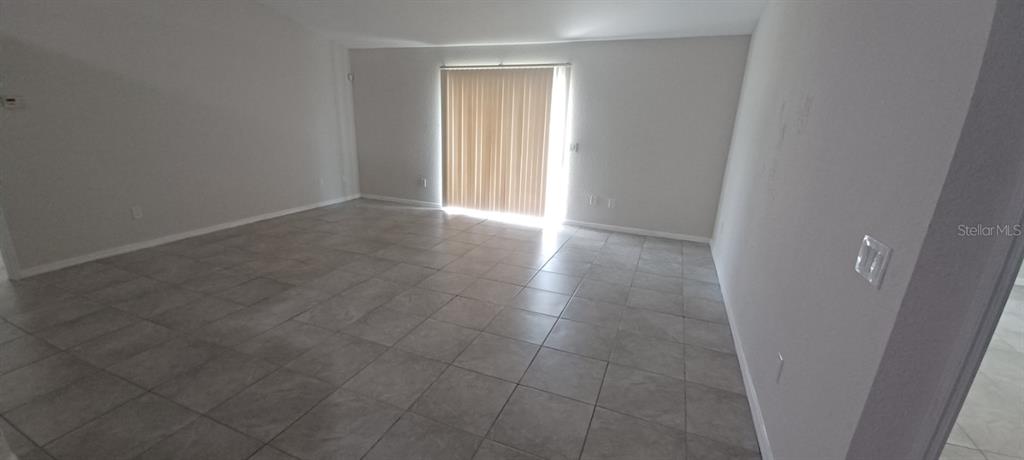 8799 Southwest 66th Avenue Ocala, FL 34476 - Photo 5 of 28 a view of a hallway in a house