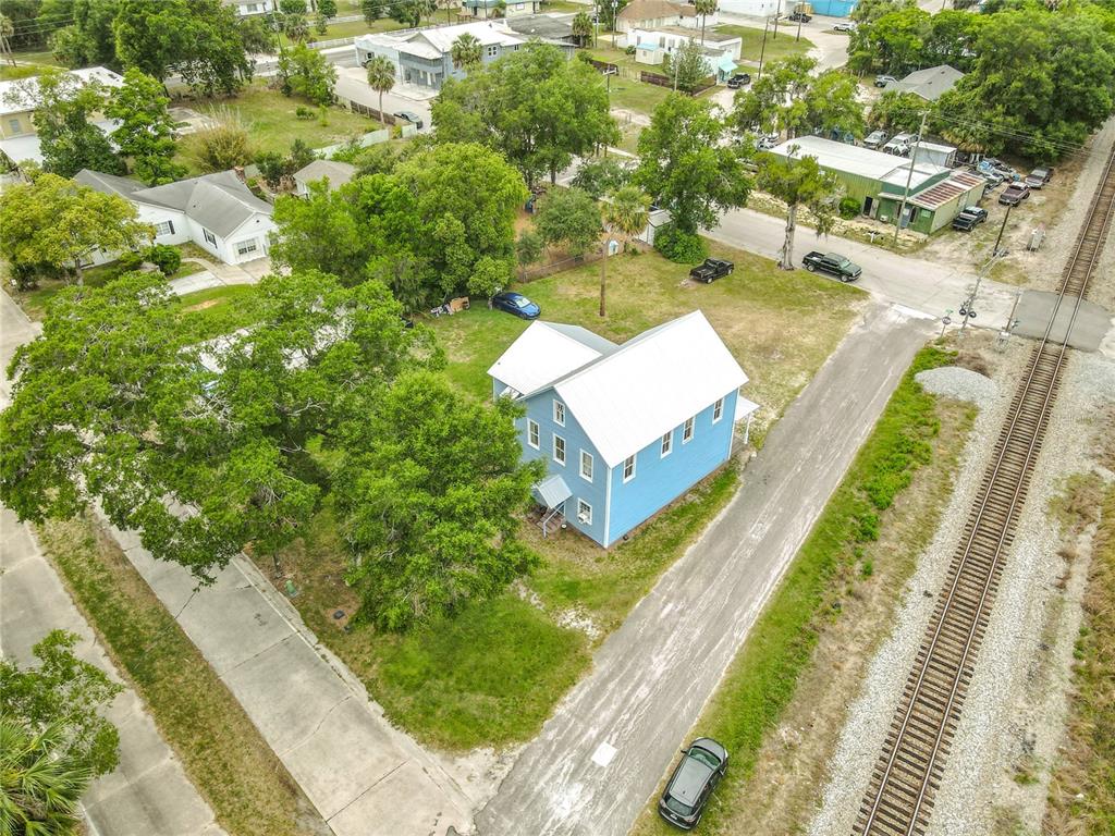 161 West 2nd Avenue Pierson, FL 32180 - Photo 24 of 32 a view of a yard with potted plants