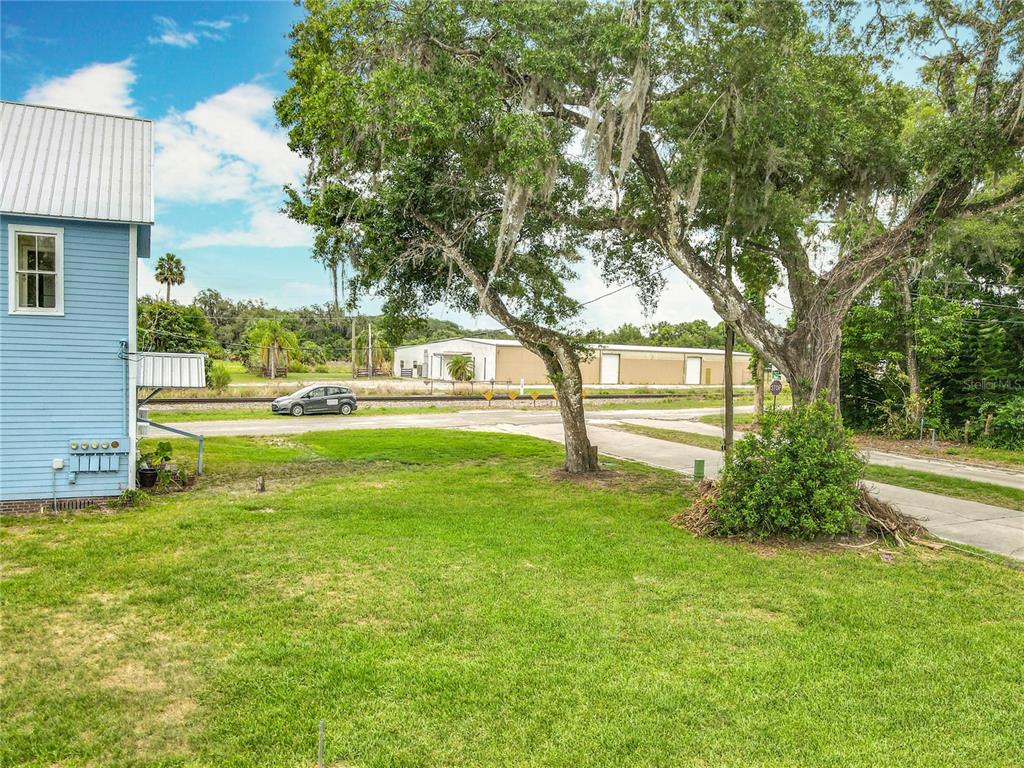 161 West 2nd Avenue Pierson, FL 32180 - Photo 25 of 32 a view of a garden with a house