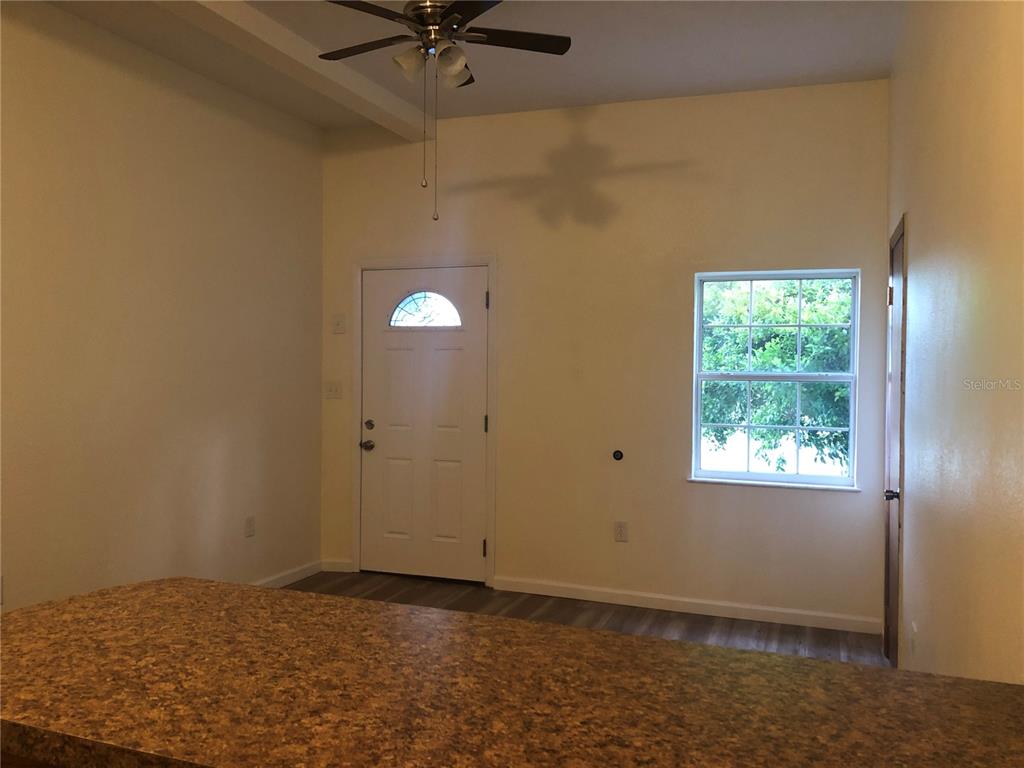 161 West 2nd Avenue Pierson, FL 32180 - Photo 6 of 32 a view of an empty room and window