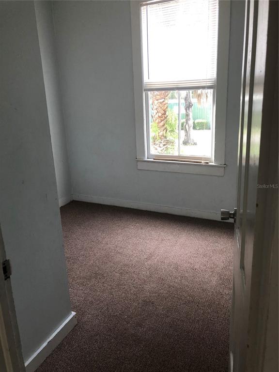 161 West 2nd Avenue Pierson, FL 32180 - Photo 8 of 32 an empty room with a window