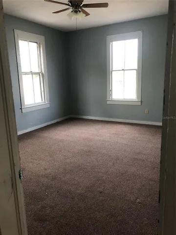 an empty room with a window