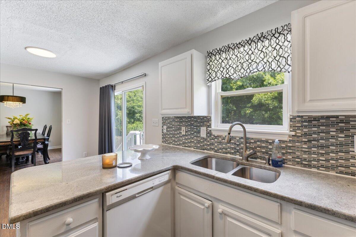4708 River Boat Landing Court Raleigh, NC 27604 - Photo 20 of 61 a kitchen with sink and window