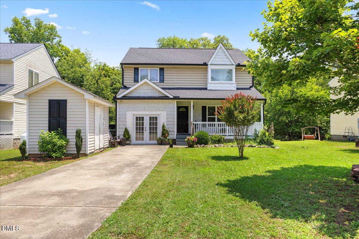 4708 River Boat Landing Court Raleigh, NC 27604 - Photo 2 of 61 a front view of a house with a yard and porch
