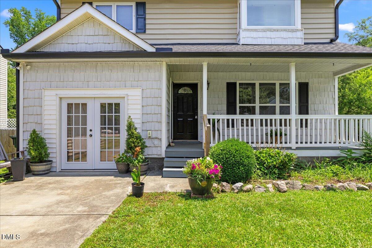 4708 River Boat Landing Court Raleigh, NC 27604 - Photo 3 of 61 a house view with a garden space