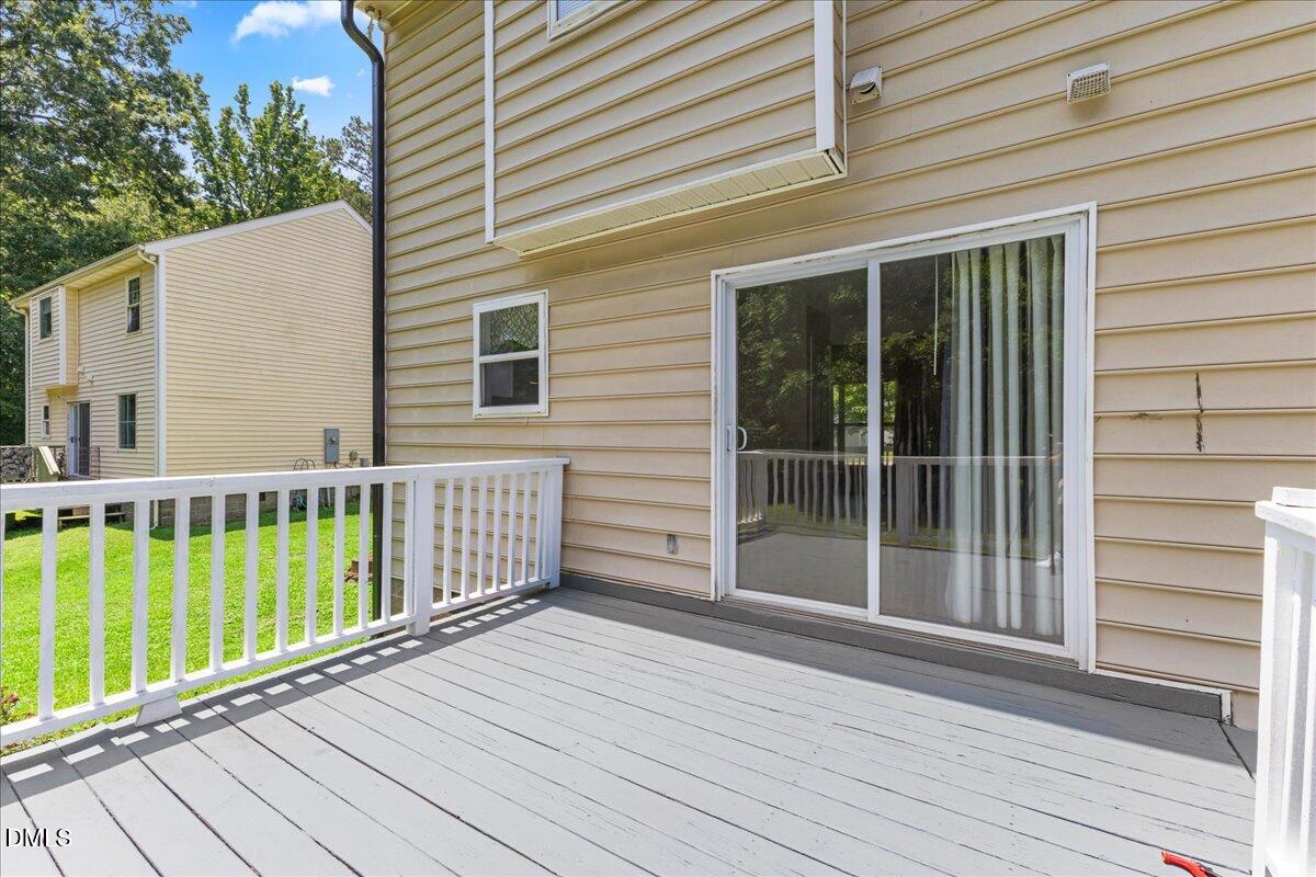 4708 River Boat Landing Court Raleigh, NC 27604 - Photo 40 of 61 a view of a wooden deck