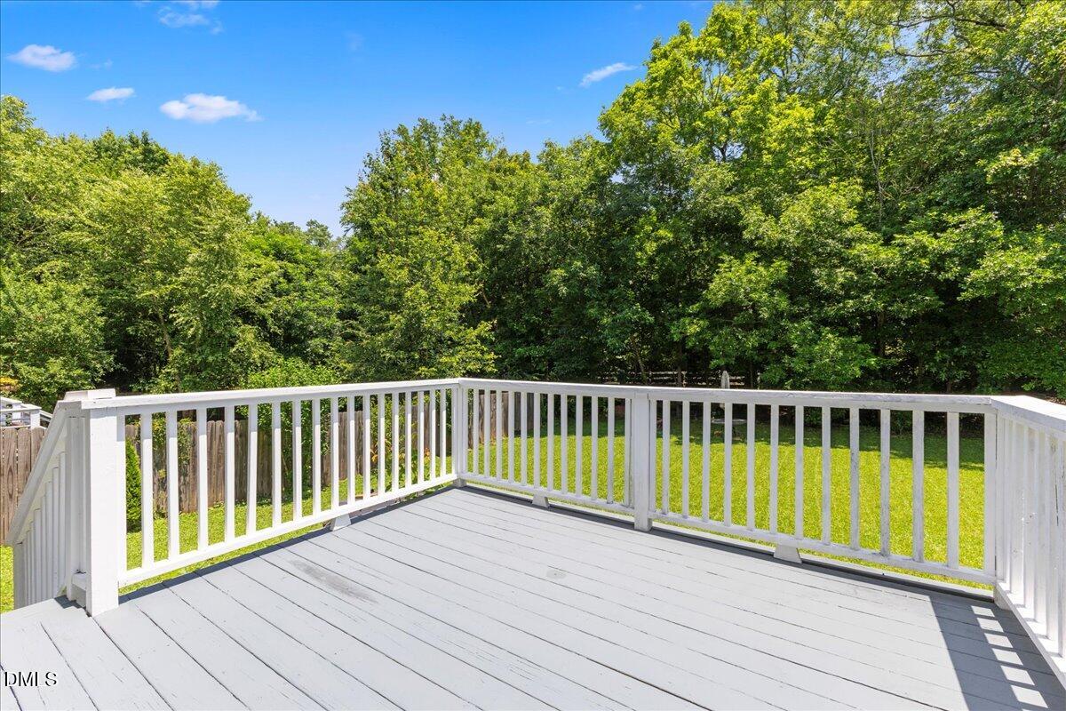 4708 River Boat Landing Court Raleigh, NC 27604 - Photo 41 of 61 a view of balcony with wooden floor and fence