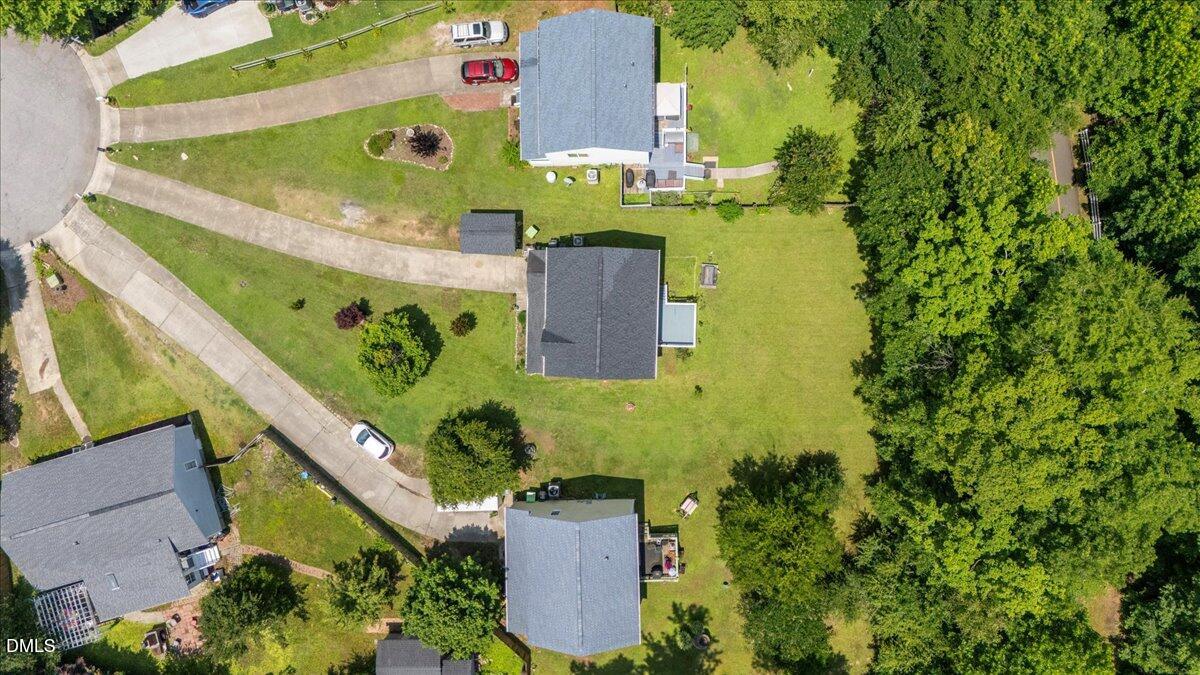 4708 River Boat Landing Court Raleigh, NC 27604 - Photo 55 of 61 an aerial view of a house with outdoor space and a lake view