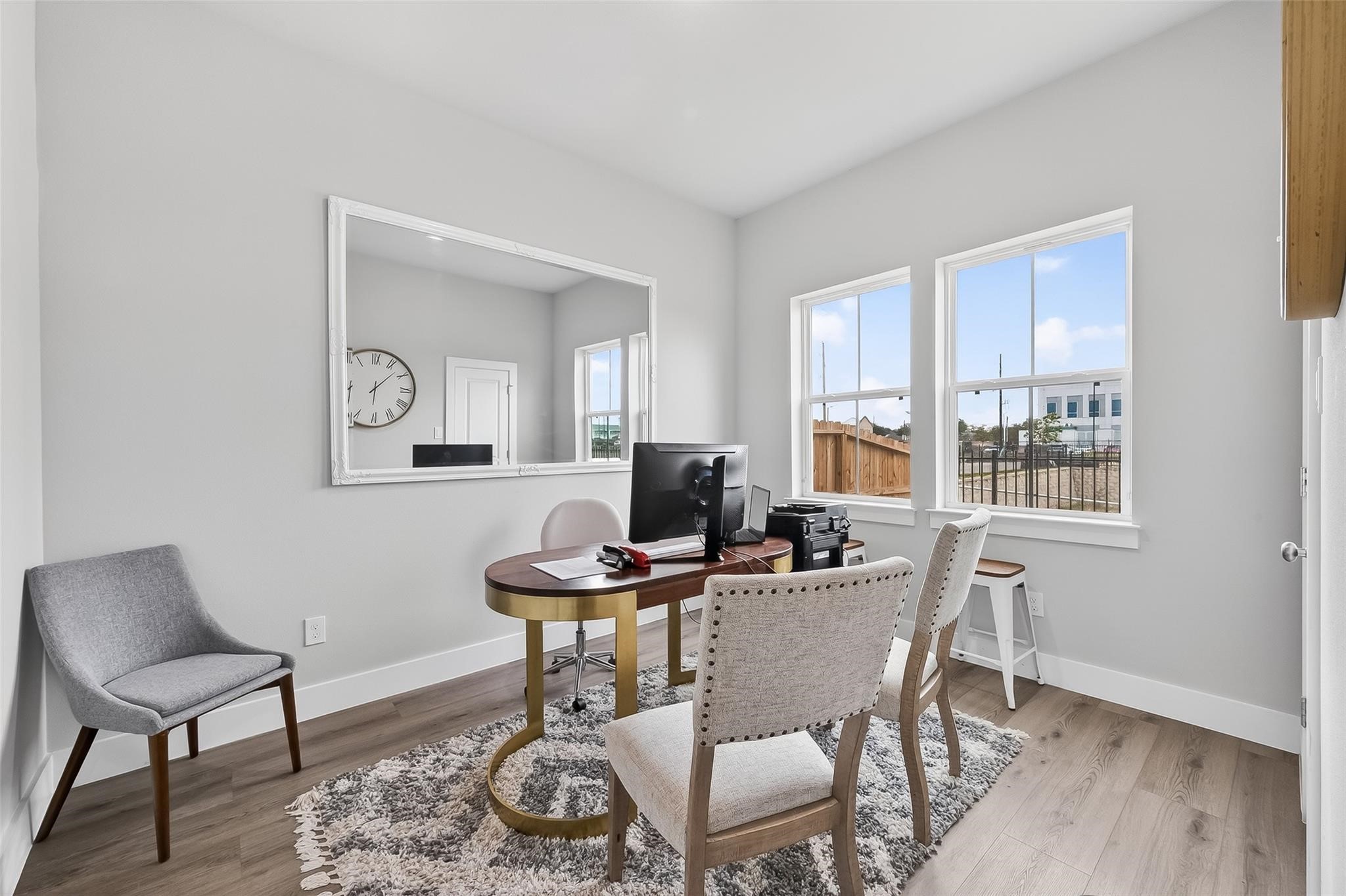 6702 Metro Boulevard, Unit 2 Houston, TX 77083 - Photo 20 of 39 a view of a dining room with furniture window and wooden floor