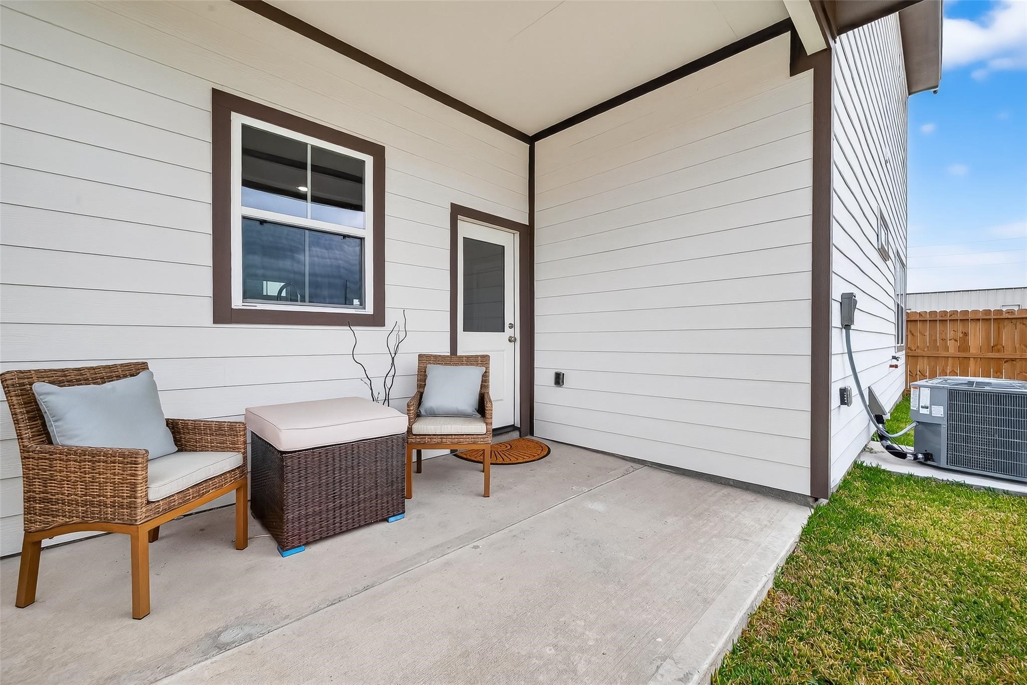 6702 Metro Boulevard, Unit 2 Houston, TX 77083 - Photo 35 of 39 a backyard of a house with sofas table and sofas
