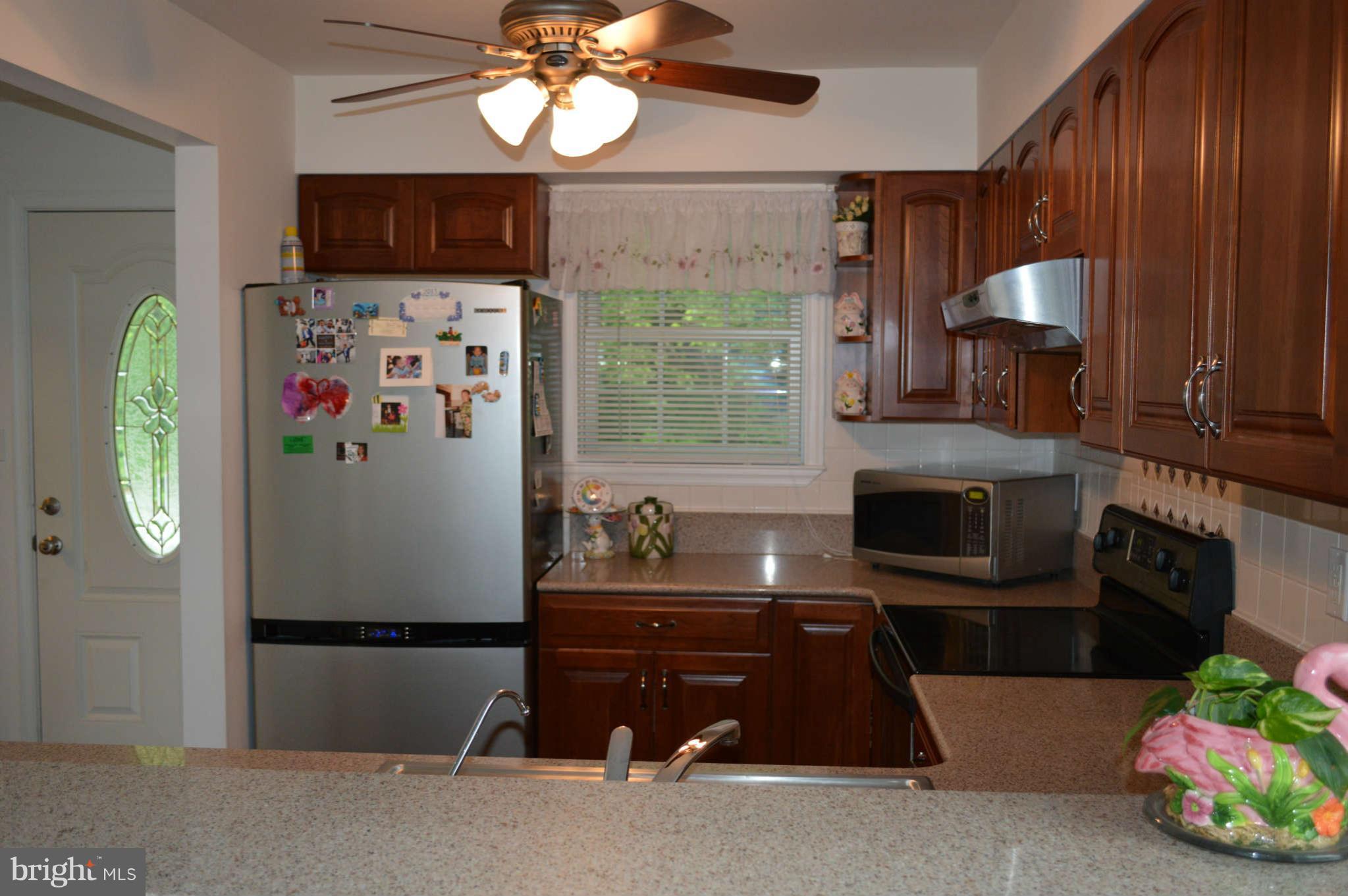 319 Timber Grove Road Owings Mills, MD 21117 - Photo 4 of 22 View from breakfast bar into kitchen