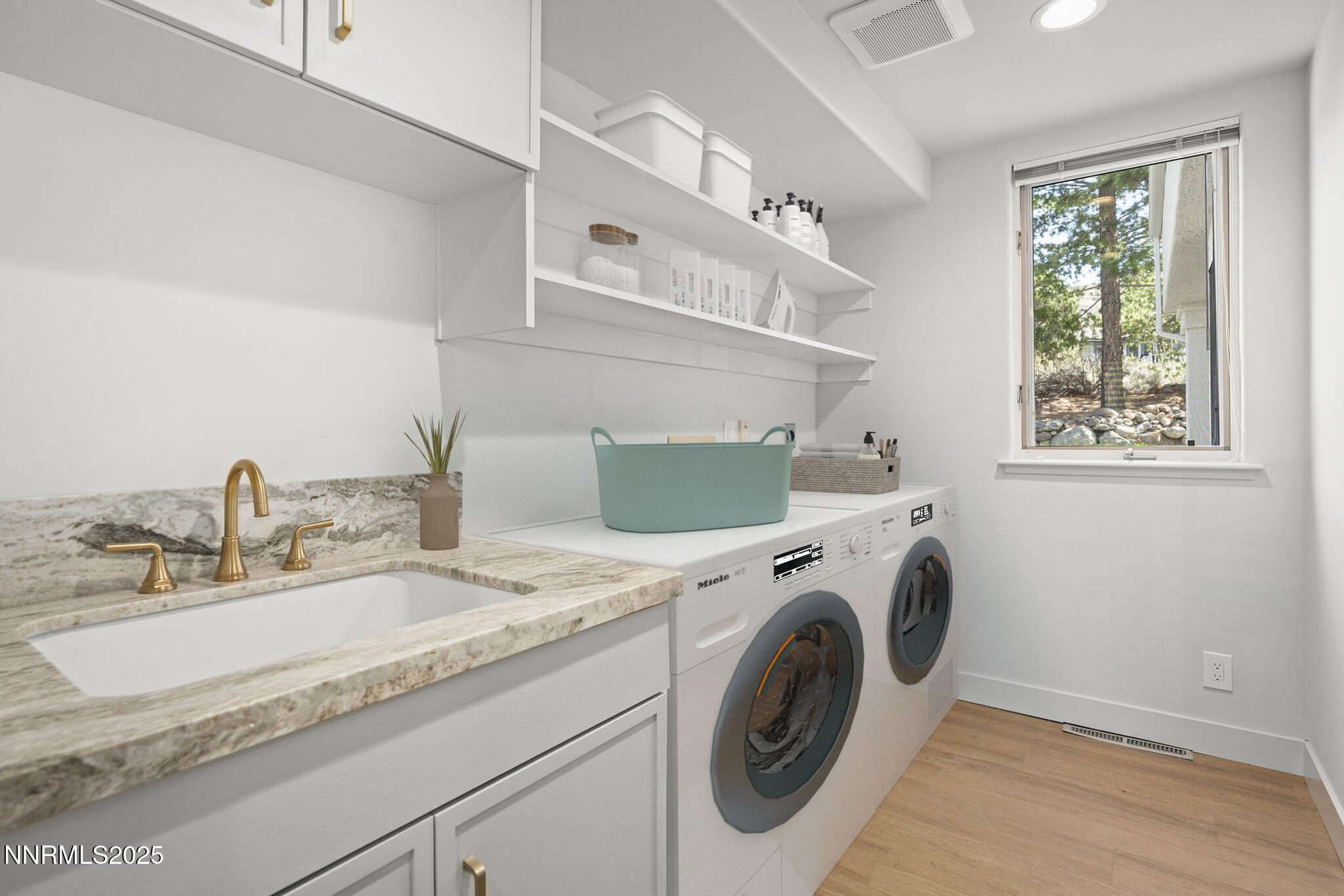 4292 Caughlin Parkway Reno, NV 89519 - Photo 23 of 37 a utility room with dryer and washer