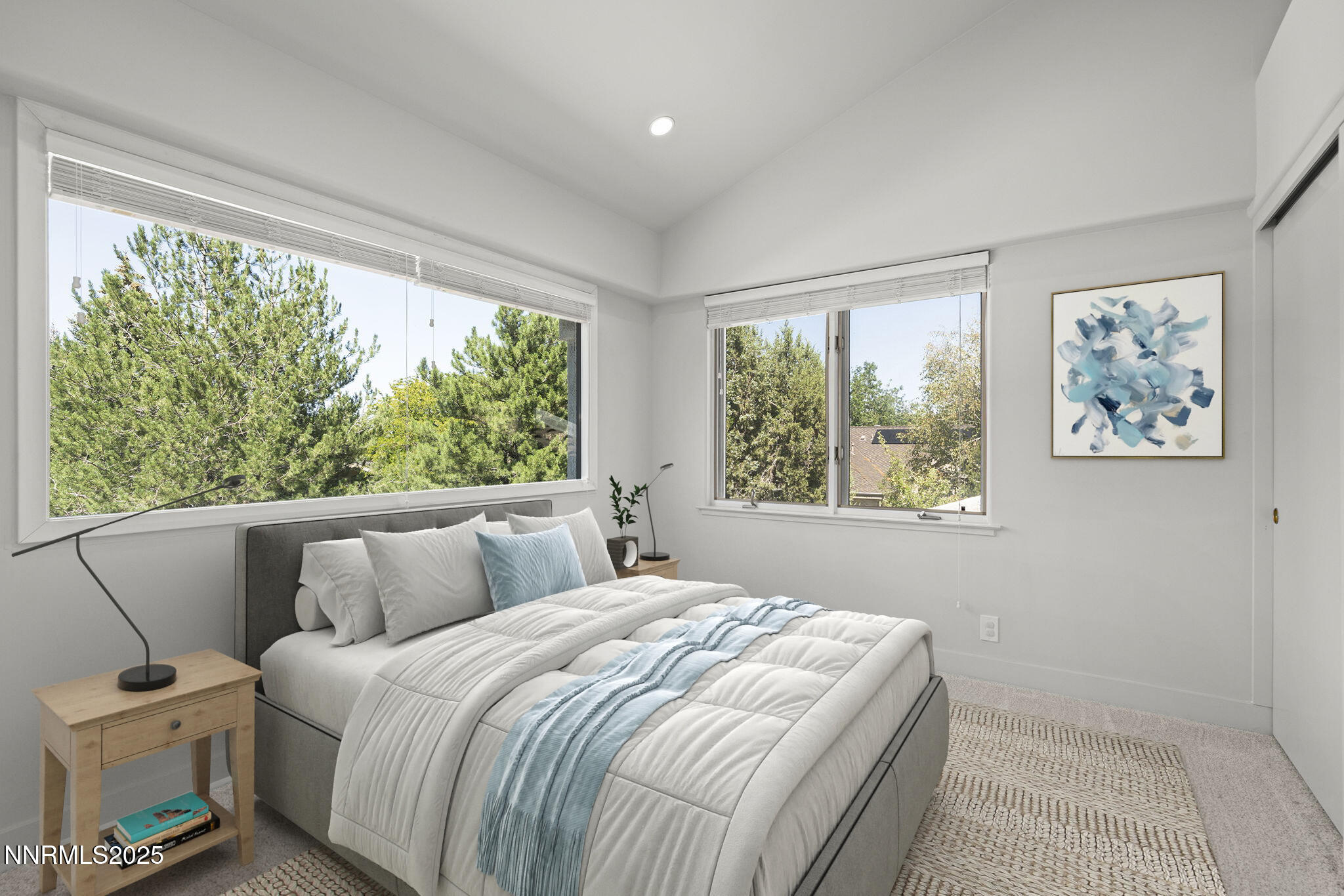 4292 Caughlin Parkway Reno, NV 89519 - Photo 27 of 37 a bedroom with a bed and a large window