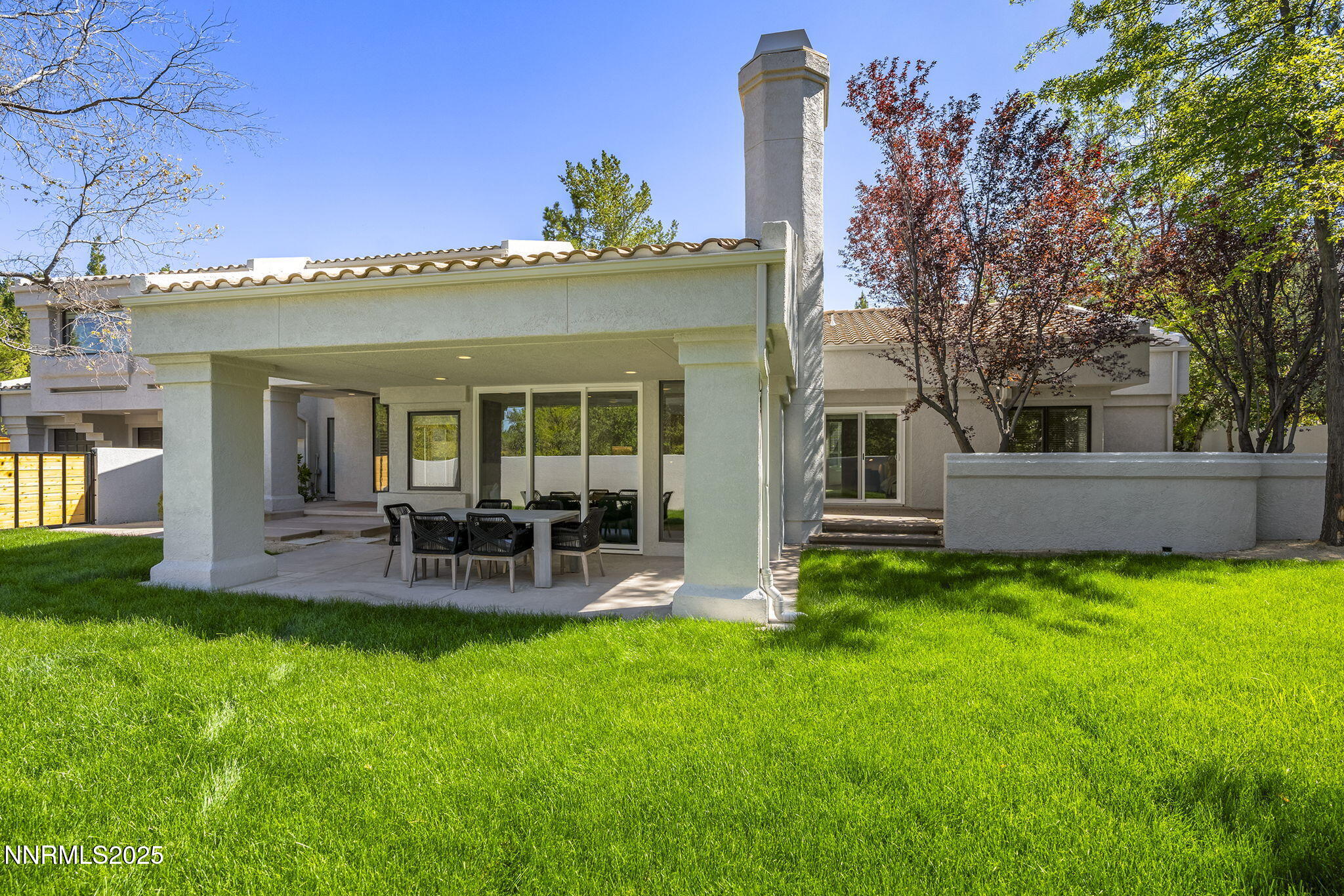 4292 Caughlin Parkway Reno, NV 89519 - Photo 33 of 37 a view of a house with a backyard porch and sitting area