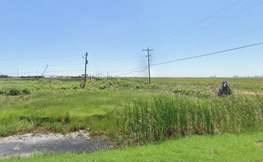 1216 Gulfview Street Freeport, TX 77541 - Photo 2 of 4 a big yard with lots of green space