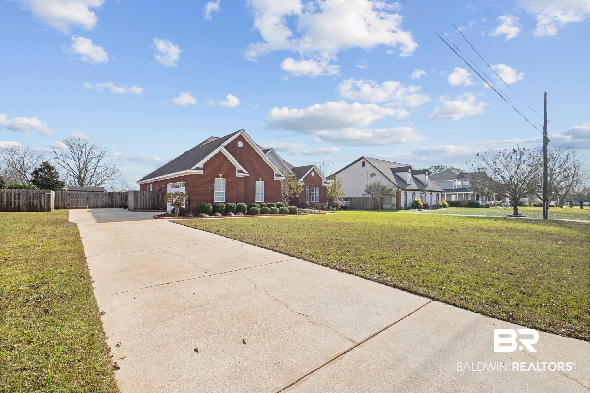 4771 Pecan Ridge East Mobile, AL 36619 - Photo 5 of 48 View of front facade with concrete driveway and brick siding