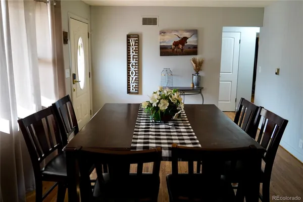 a view of a bathroom from a hallway