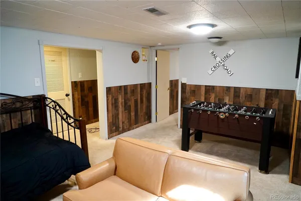 a kitchen with stainless steel appliances granite countertop a stove and a wooden cabinets