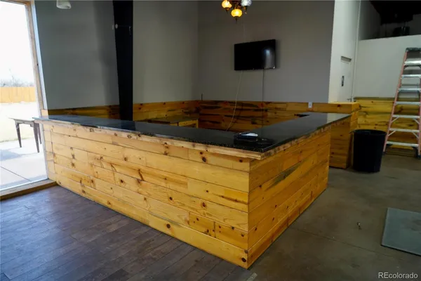a view of a bedroom with staircase