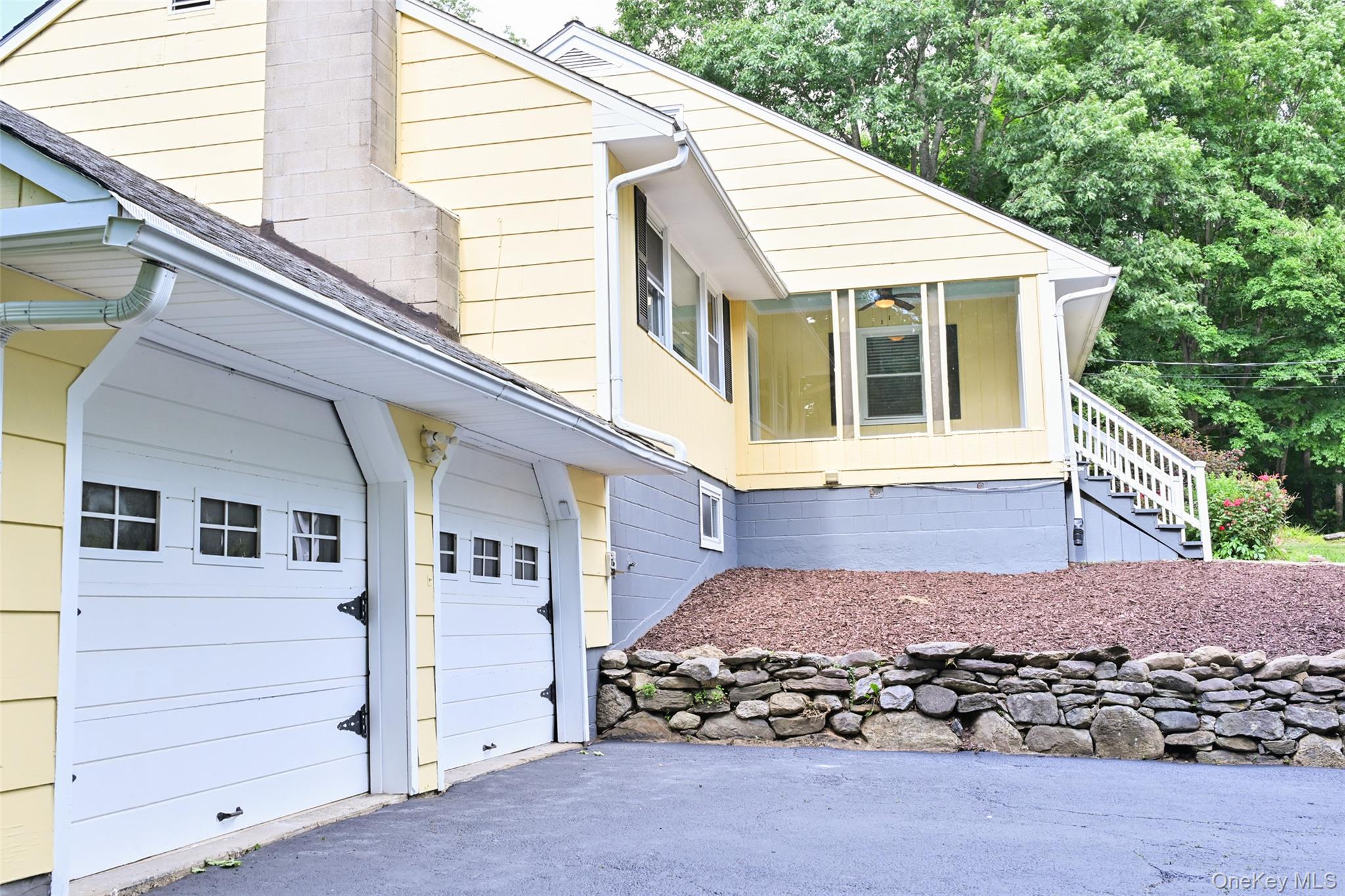 136 Foggintown Road Brewster, NY 10509 - Photo 2 of 50 a view of a house with a yard