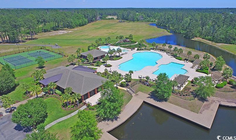 1027 Clamour Court Conway, SC 29526 - Photo 8 of 25 Drone / aerial view of a pool and a large body of water